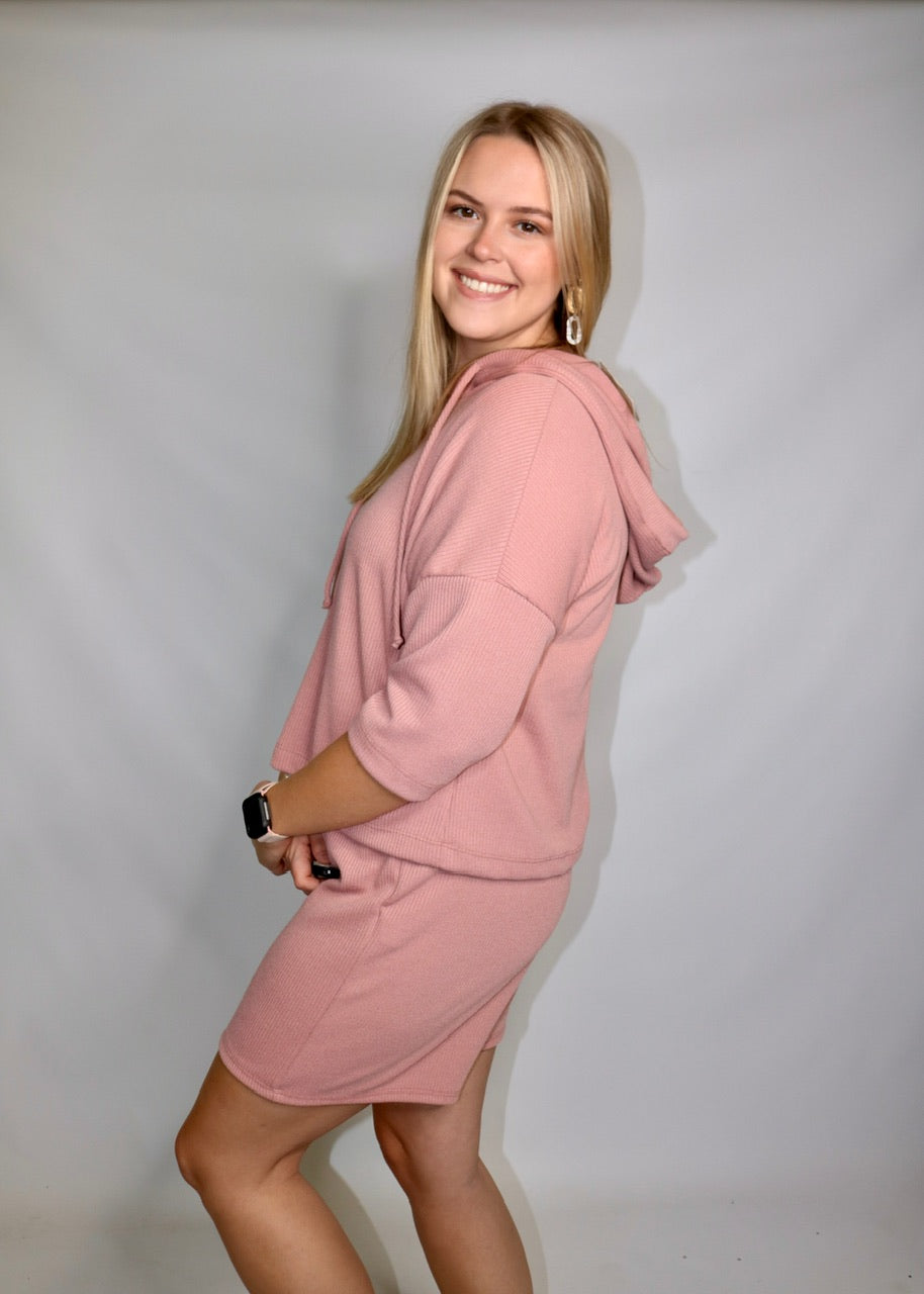 side view of a mauve lounge set showing the hood, dropped shoulders and matching shorts
